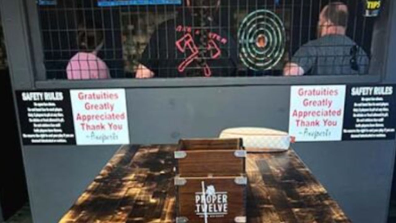 Axe tossing venue with safety rules