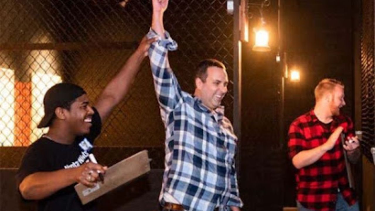 People enjoying an axe throwing party