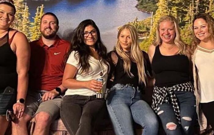 Group of friends posing inside Montana Nights.