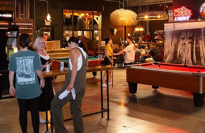Spacious Montana Nights Newington with pool tables, arcade games, and social lounge area