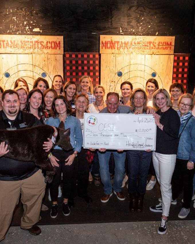 Colleagues celebrate together after a fun and competitive group experience at Montana Nights.