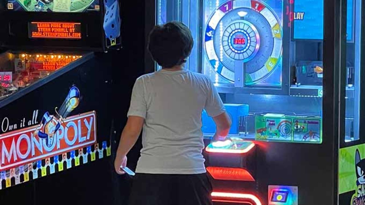  Guest playing a prize arcade game at Montana Nights. 