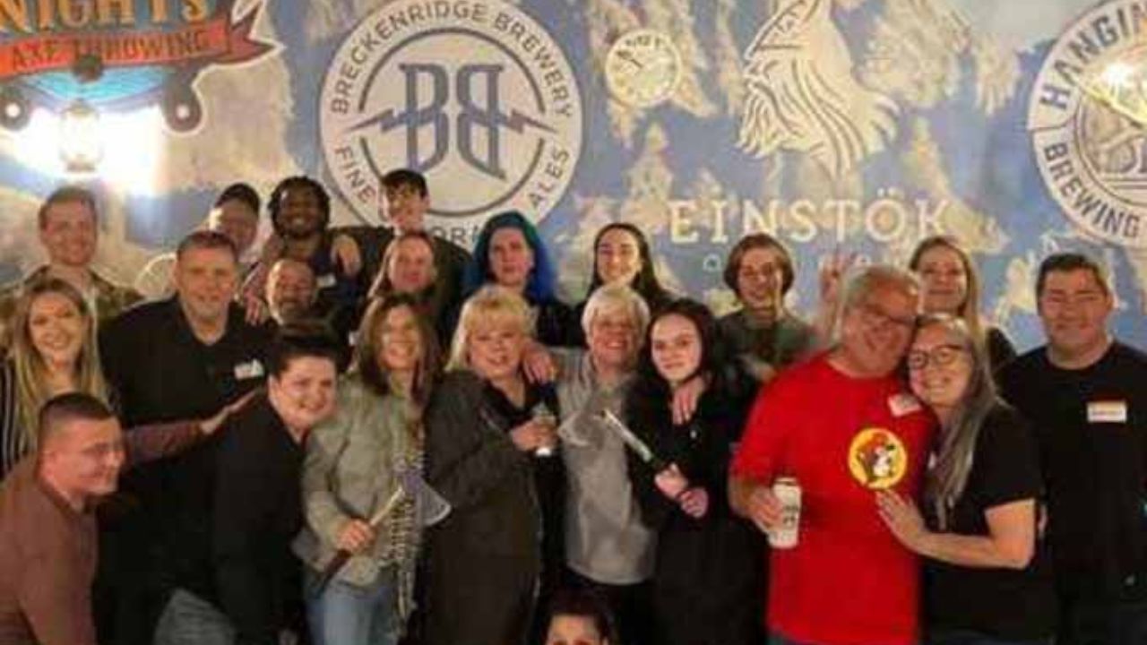 Large group gathering for a social celebration at Montana Nights Axe Throwing. 